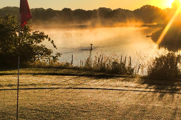 hole #7 with pond at golden hour